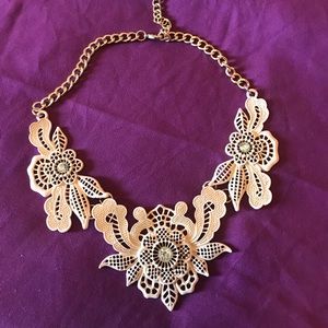 Goldtone necklace with pink flowers
